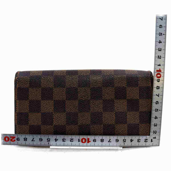 Pre-loved authentic Louis Vuitton Portefeuille Sarah sale at jebwa