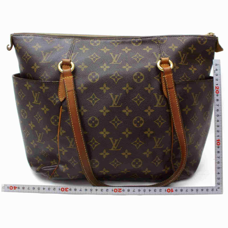 Pre-loved authentic Louis Vuitton Totally Mm Tote Bag sale at jebwa