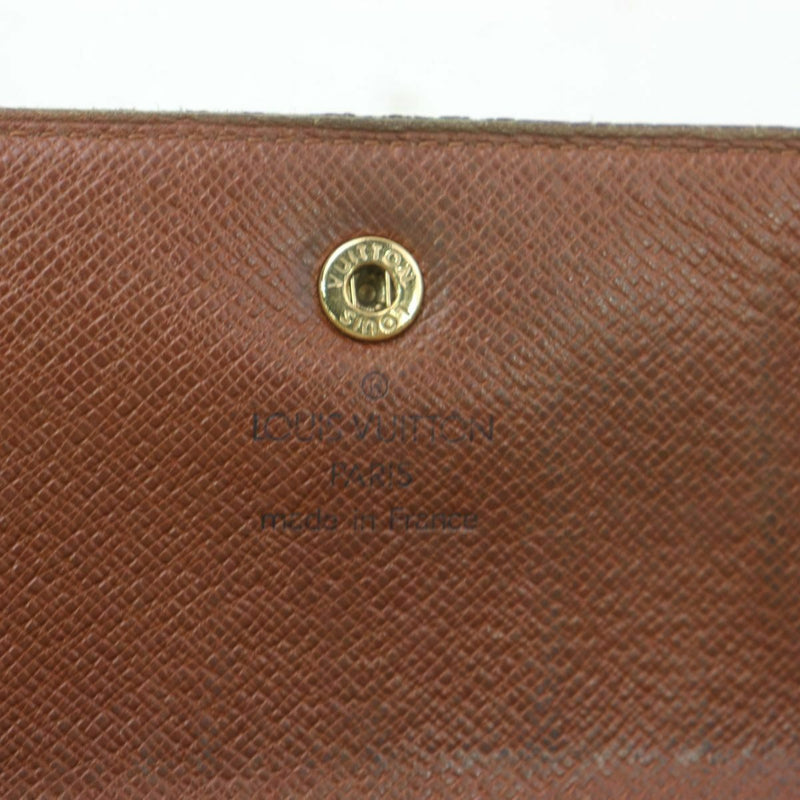 Pre-loved authentic Louis Vuitton Porte Tresor Long sale at jebwa.