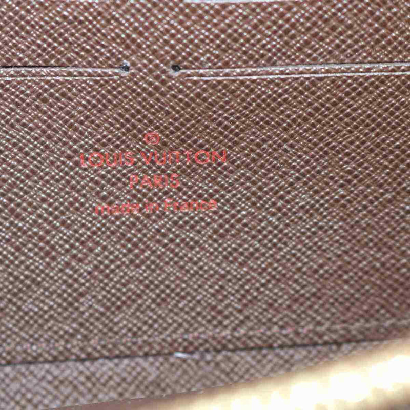 Pre-loved authentic Louis Vuitton Zippy Wallet Brown sale at jebwa.