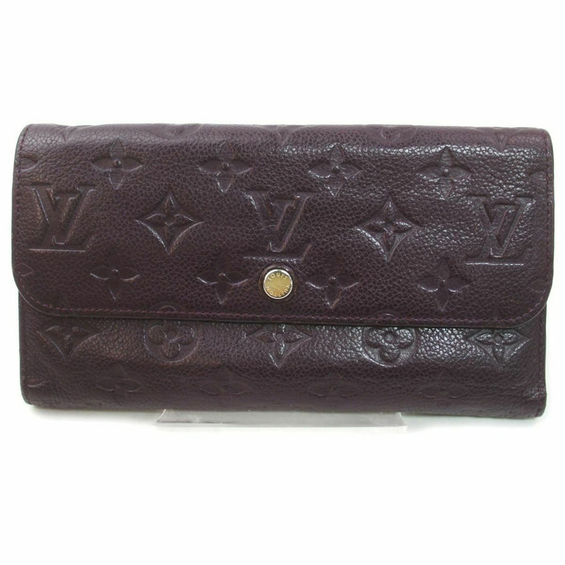 Pre-loved authentic Louis Vuitton Portefeuille Virtuose sale at jebwa.