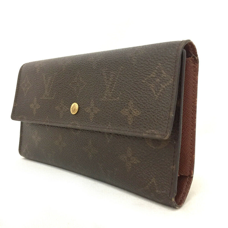 Pre-loved authentic Louis Vuitton Porte Tresor sale at jebwa.