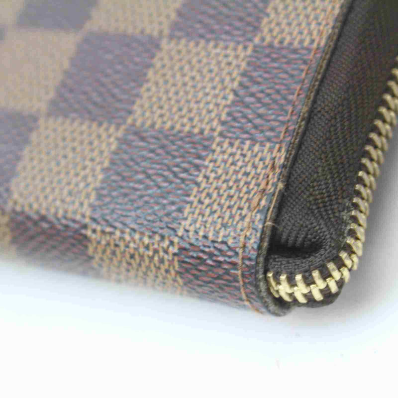 Pre-loved authentic Louis Vuitton Zippy Wallet Brown sale at jebwa.