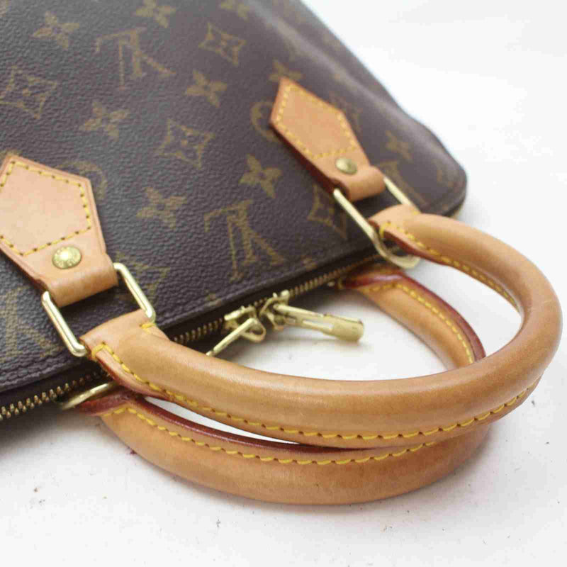 Pre-loved authentic Louis Vuitton Alma Hand Bag Brown sale at jebwa.