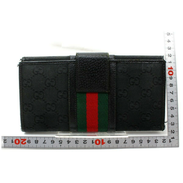 Pre-loved authentic Gucci Long Wallet Black Canvas sale at jebwa.