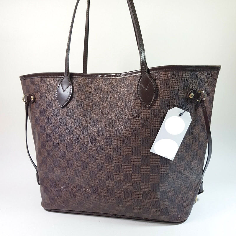 Pre-loved authentic Louis Vuitton Neverfull Mm Tote Bag sale at jebwa.