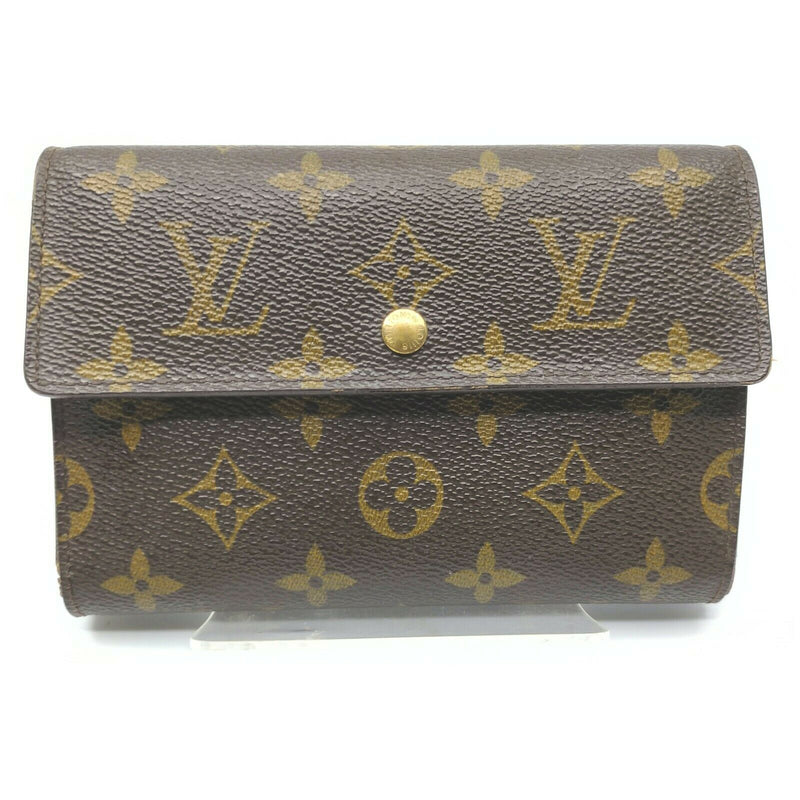 Pre-loved authentic Louis Vuitton Porte Tresor Wallet sale at jebwa.