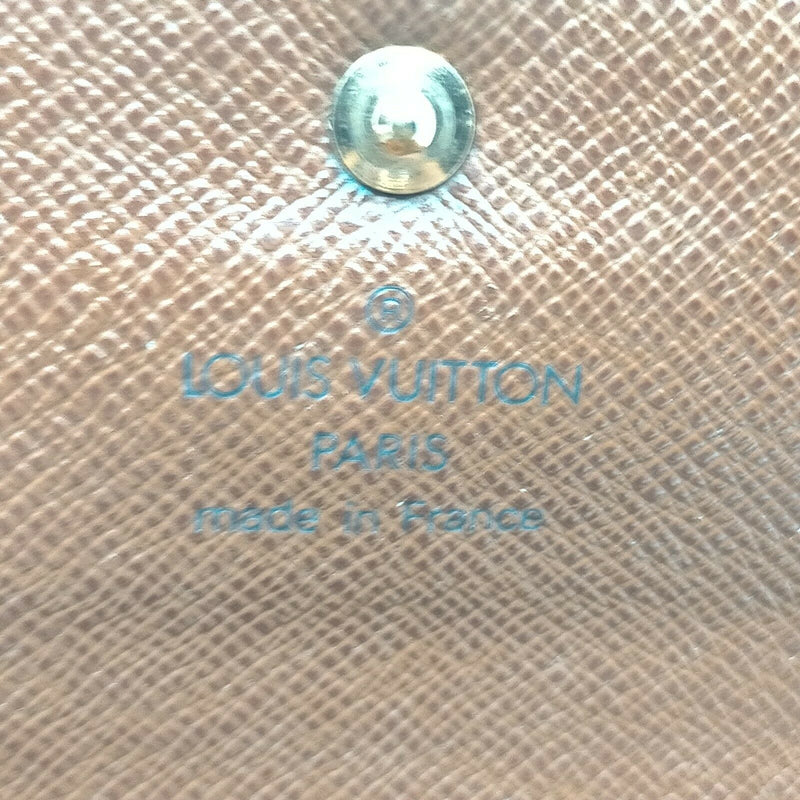 Pre-loved authentic Louis Vuitton Porte Tresor Wallet sale at jebwa.