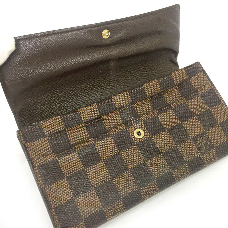 Pre-loved authentic Louis Vuitton Porte Sarah Long sale at jebwa.