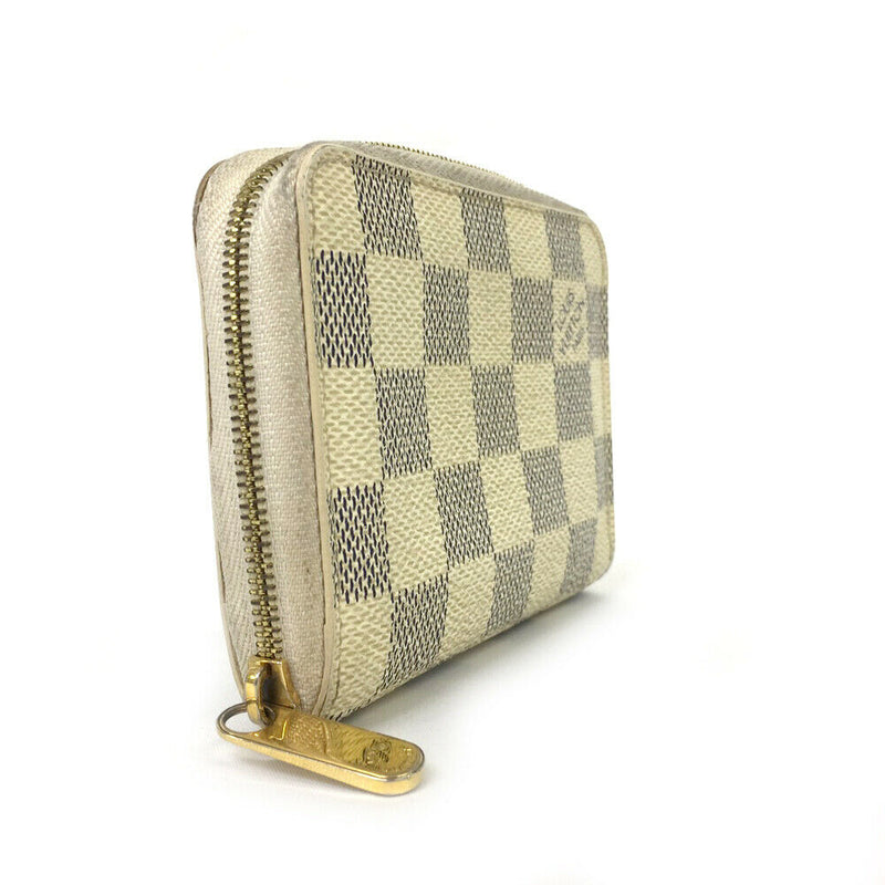 Pre-loved authentic Louis Vuitton Zipper Coin Purse sale at jebwa.