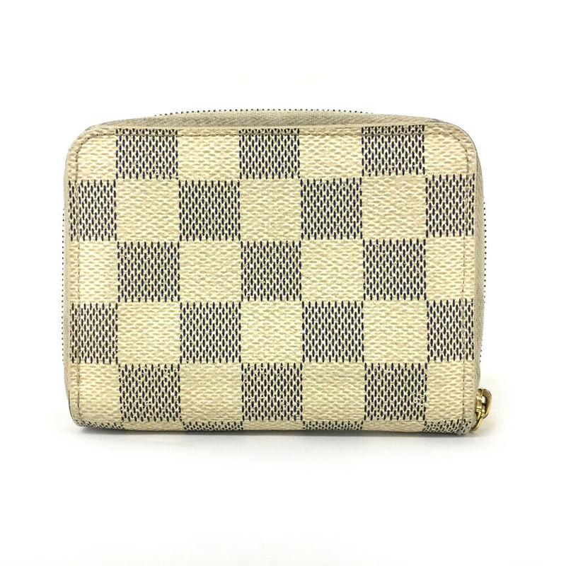 Pre-loved authentic Louis Vuitton Zipper Coin Purse sale at jebwa.