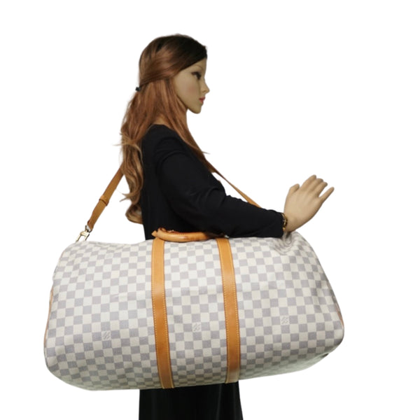 Pre-loved authentic Louis Vuitton Keepall 55 sale at jebwa.