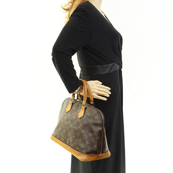 Pre-loved authentic Louis Vuitton Alma Hand Bag sale at jebwa.