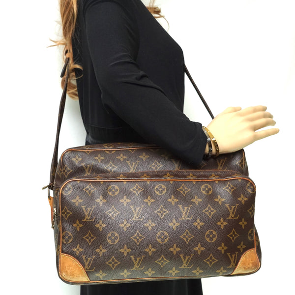 Pre-loved authentic Louis Vuitton Nile Gm Crossbody Bag sale at jebwa.