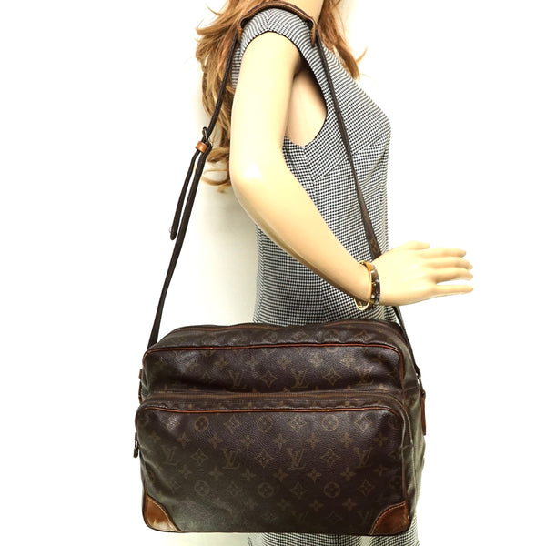 Pre-loved authentic Louis Vuitton Nile Gm Crossbody Bag sale at jebwa