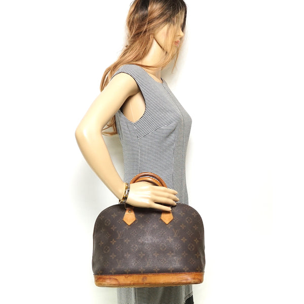 Pre-loved authentic Louis Vuitton Alma Satchel Bag sale at jebwa