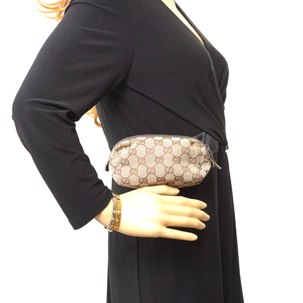 Pre-loved authentic Gucci Cosmetic Bag Brown Canvas sale at jebwa