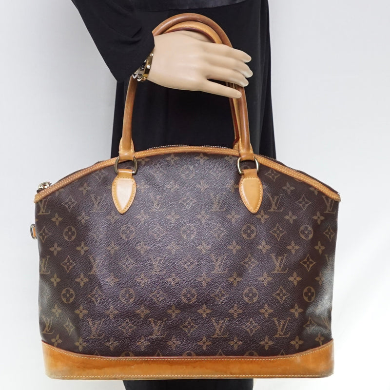 Pre-loved authentic Louis Vuitton Lockit Tote Bag Brown sale at jebwa.