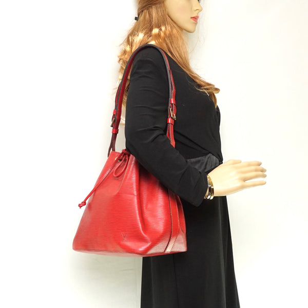 Pre-loved authentic Louis Vuitton Noe Pm Epi Red sale at jebwa