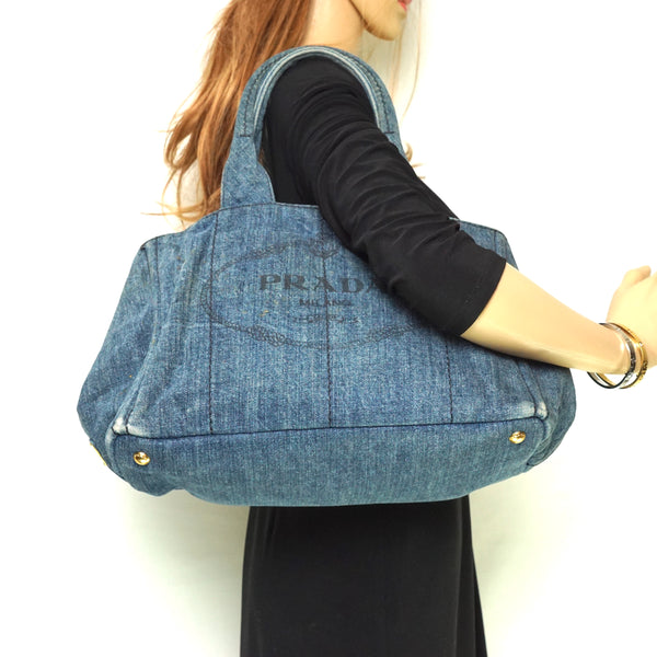 Pre-loved authentic Prada Hand Bag Blue Denim Satchel sale at jebwa
