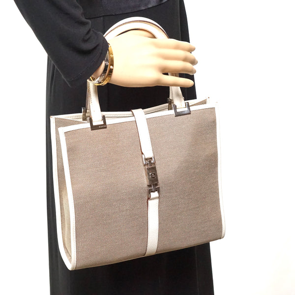 Pre-loved authentic Gucci Jackie Khaki Ivory Jacquard sale at jebwa