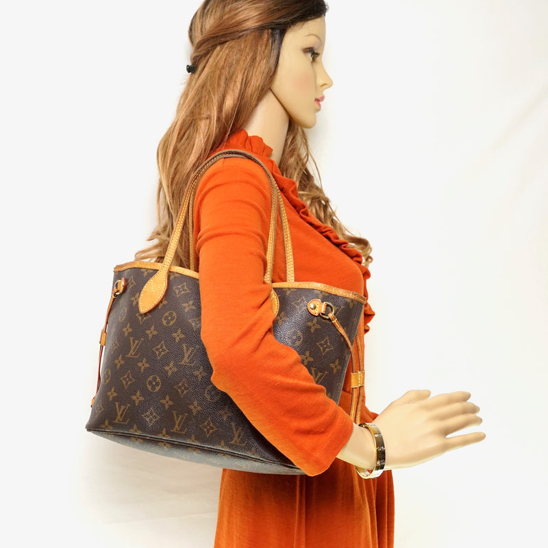 Pre-loved authentic Louis Vuitton Neverfull Pm Tote Bag sale at jebwa.