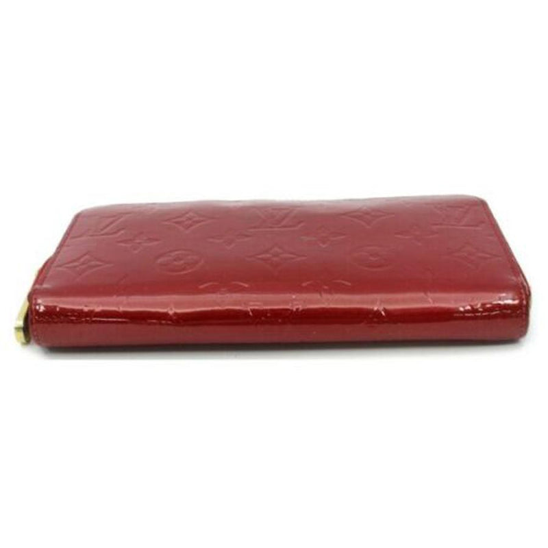 Pre-loved authentic Louis Vuitton Zippy Wallet Red sale at jebwa.